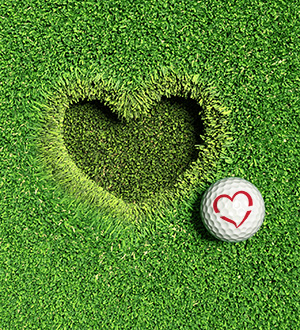 Heart-shaped golf hole with MVCU golf ball