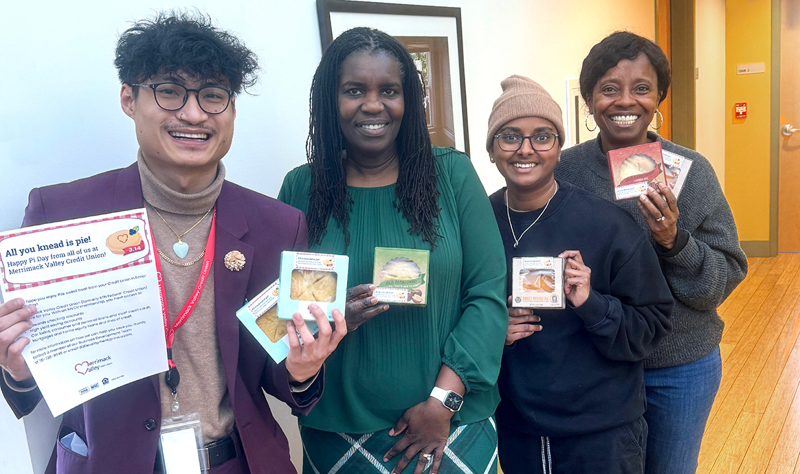 MVCU’s Business Development Officer Kevin Huynh (far left) smiles with members of the Massachusetts Affordable Housing Alliance team in Dorchester and their assortment of Table Talk pies. 