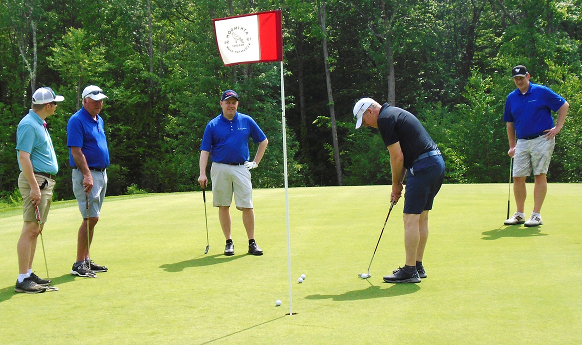 MVCU President & CEO John J. Howard with the foursome from Synergent, this year’s tournament sponsor.