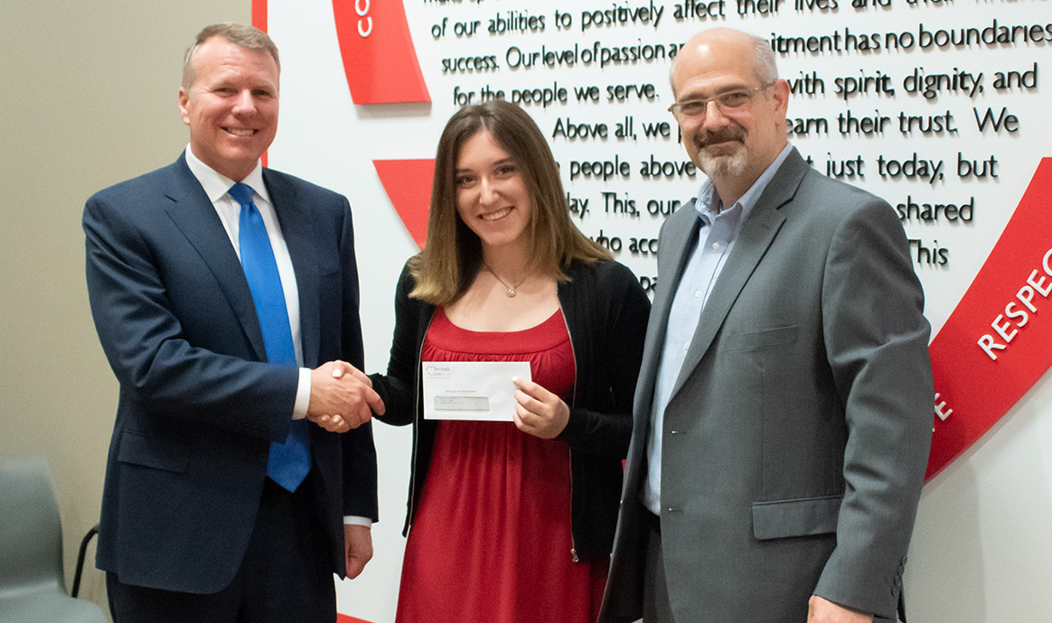 MVCU President & CEO John J. Howard (left) and Brad Goodman (right) with Brooke Boucher, the 2nd annual recipient of the Lisa Lewis Goodman Spirit Award 