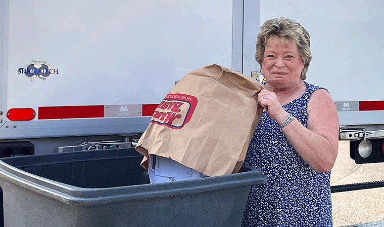 Longtime MVCU member shreds her documents