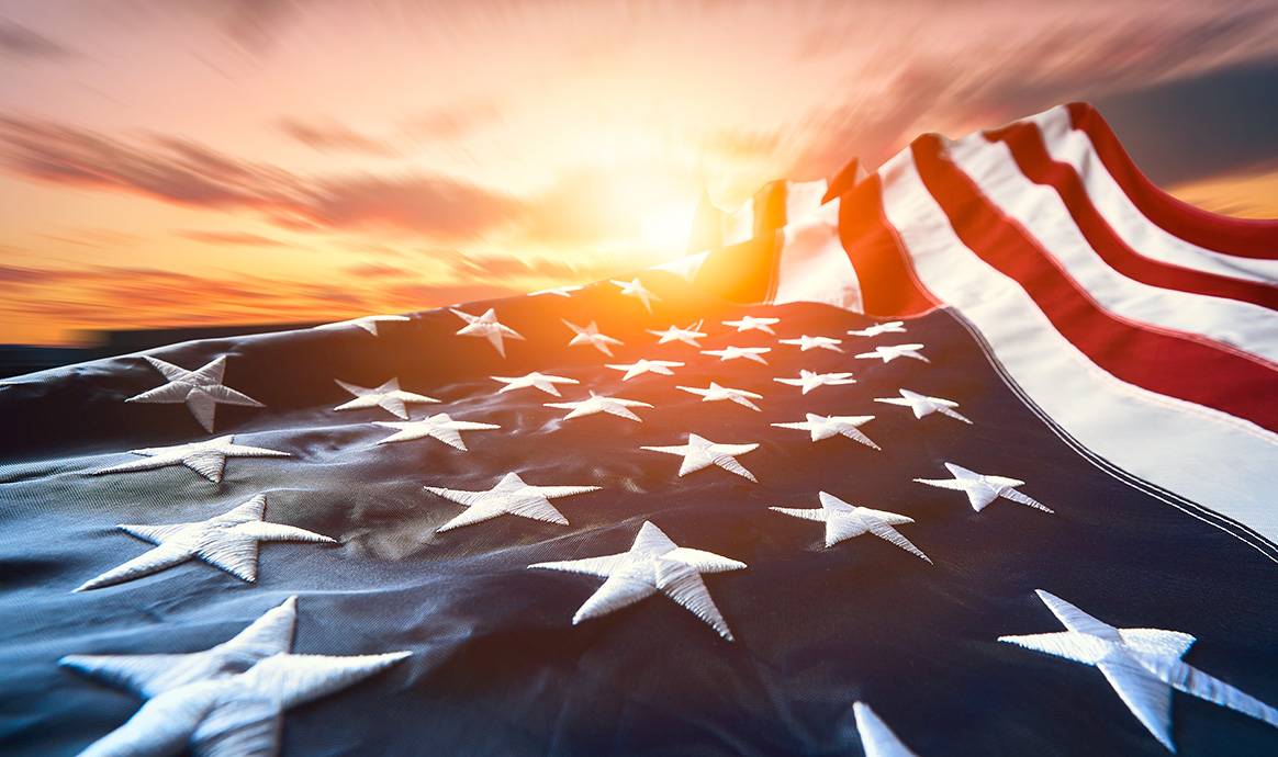 American flag at sunset